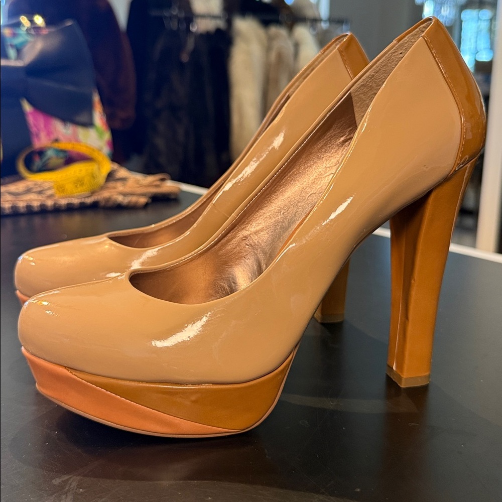 BCBG Paris Nude Patent Leather Platform Pumps
Size 6.5 - Picture 5 of 10